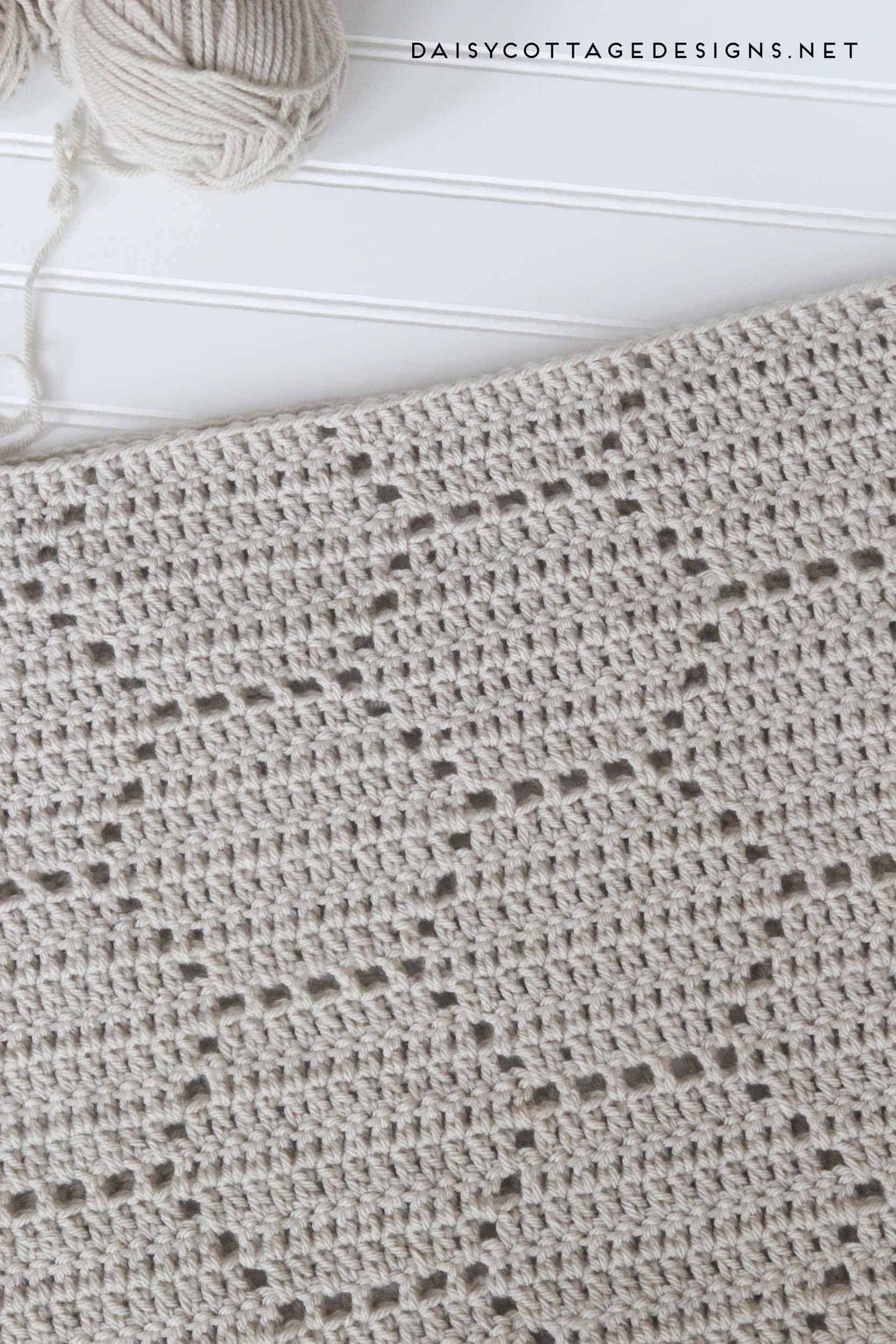 Use this filet crochet pattern to create a beautiful honeycomb blanket. This easy crochet pattern works up quickly and yields gorgeous results. 