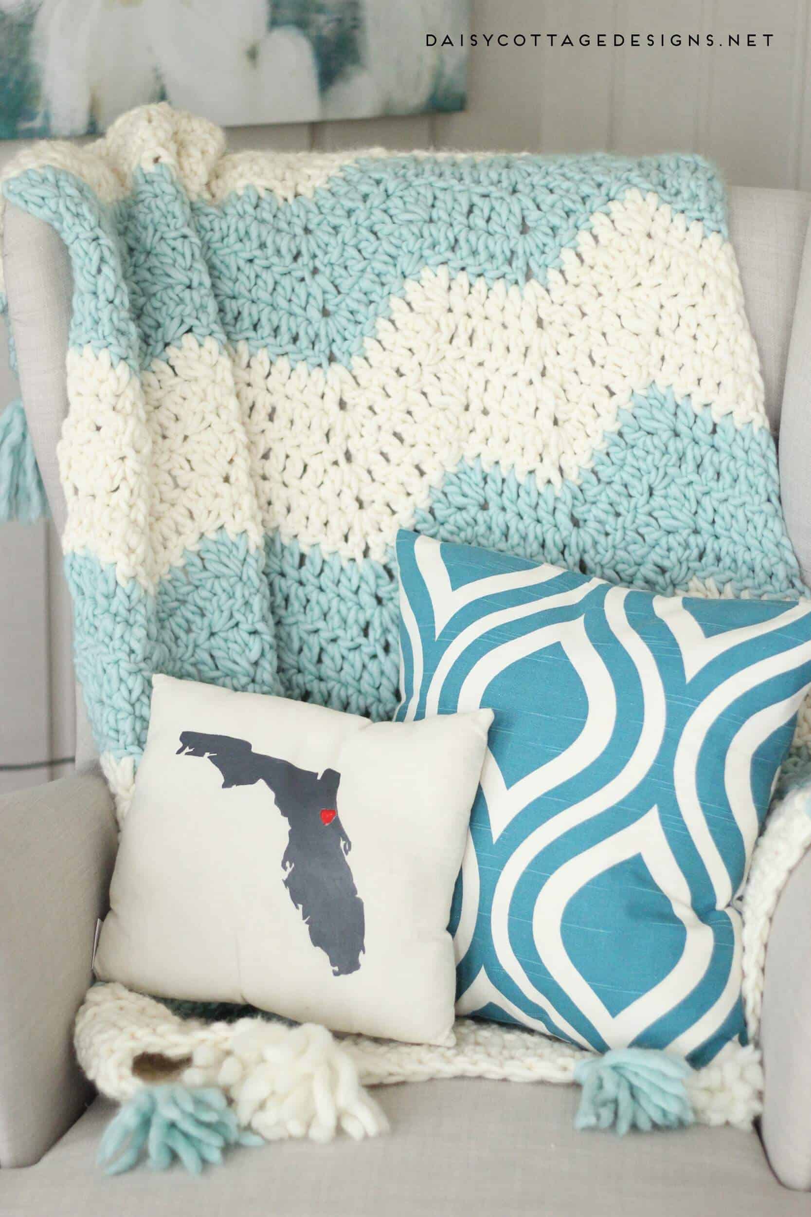 Chunky Chevron Crochet Blanket with Tassels. Beautiful and easy to make. Get a discount on this beautiful Yarn, too! | chunky chevron blanket, quick crochet blanket, bulky yarn patterns, Daisy Cottage Designs