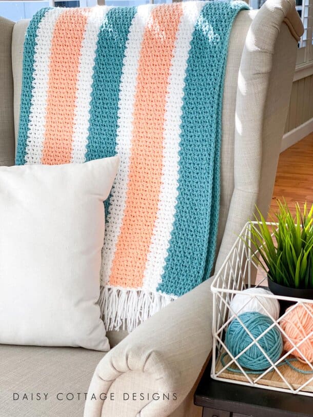 V Stitch Crochet at its finest! Learn how to create this gorgeous crochet blanket using use this quick and easy free crochet pattern.