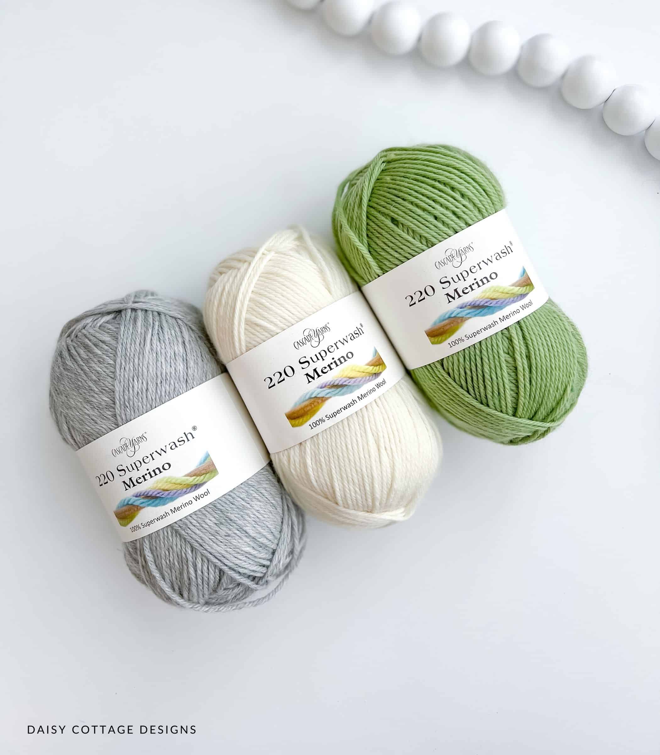Superwash Merino Wool Yarn in Gray, cream, and green