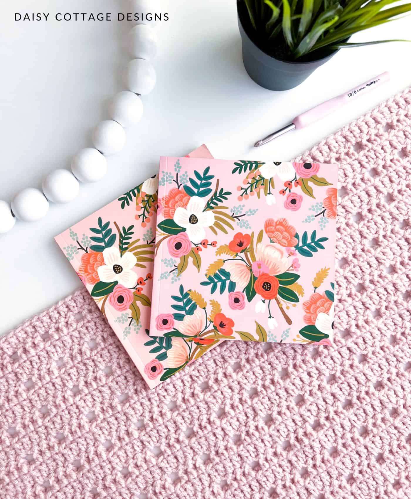 crochet blanket with floral books