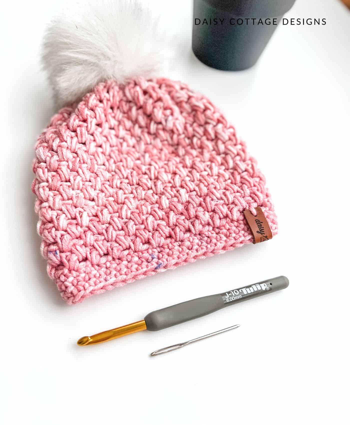 Crochet hook, tapestry needle, hat